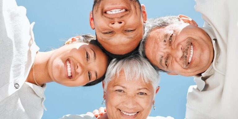 Elderly Couple With Their Skilled Nurses in a Circular Selfie Shot Outside Independent Living Facility